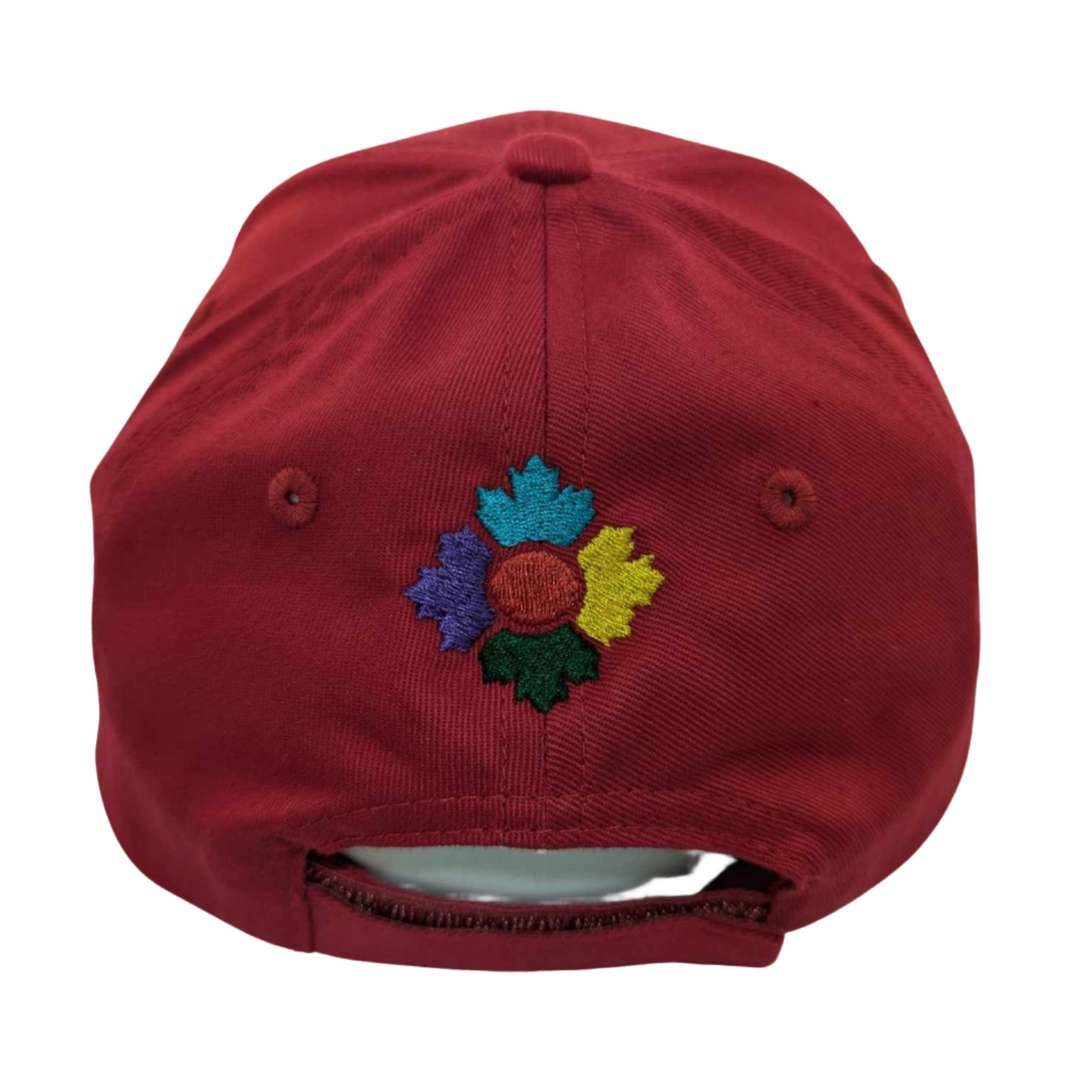 Back side of red hat with museum's icon of four maple leaves in blue, yellow, green and purple with red center circle embroidered above velcro closure 