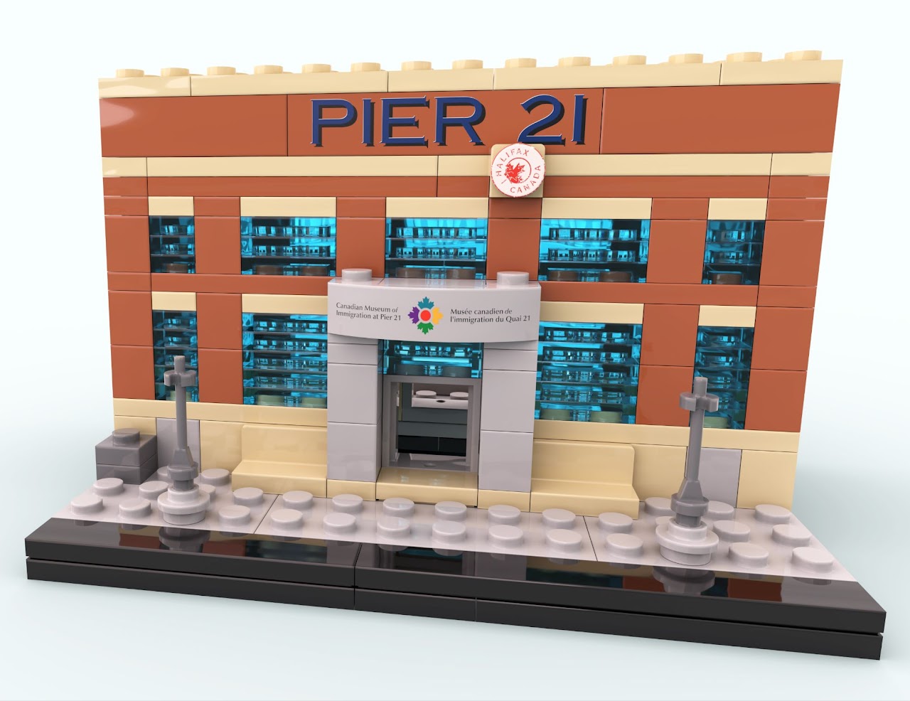 Front of built Pier 21 brick kit with historic Pier 21 signage and new Canadian Museum of Immigration at Pier 21 logo above the door frame