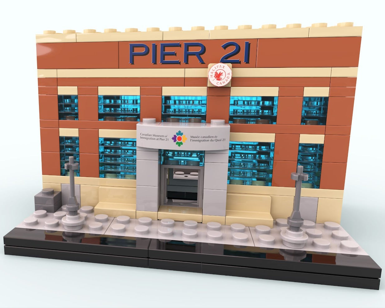 Front of built Pier 21 brick kit with historic Pier 21 signage and new Canadian Museum of Immigration at Pier 21 logo above the door frame