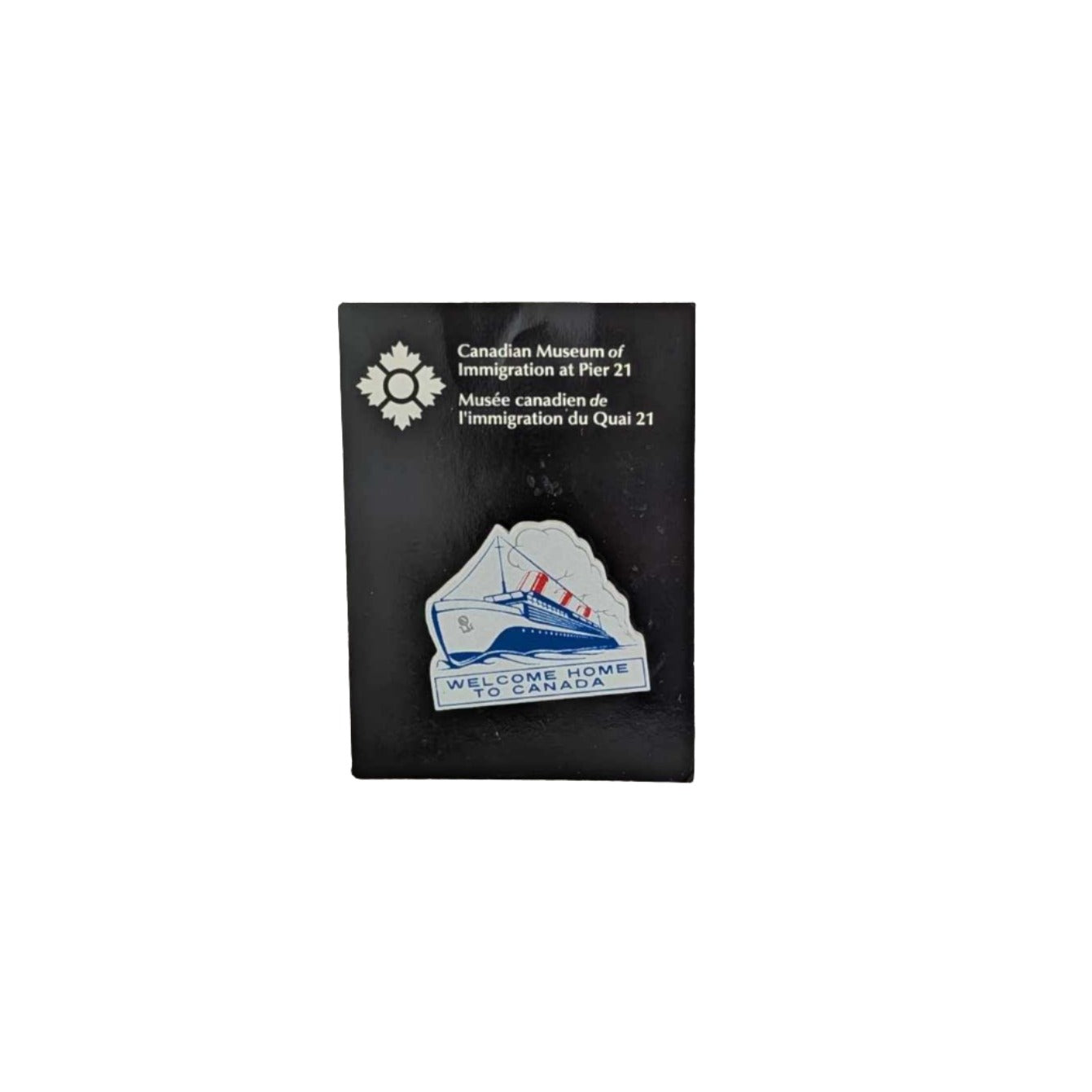 White pin with blue outline of steam ship with red funnels and Welcome Home to Canada underneath on a black backing card with Museum's logo on top  